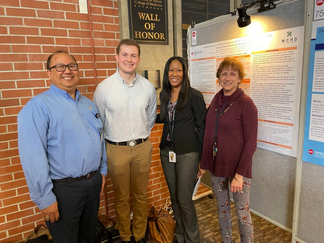 Ray Garcia, Will Graft, Alesia Hawkins-Jones, and Geri Fox on Research Day, March 2023.