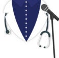 white jacket and navy button up with stethoscope and microphone