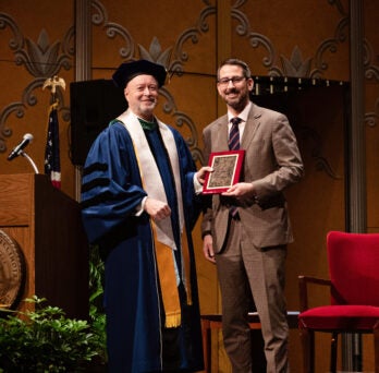 Mayor Tom McNamara received the Distinguished Community Award from Alex Stagnaro-Green, MD, MHPE, MHA, regional dean. 